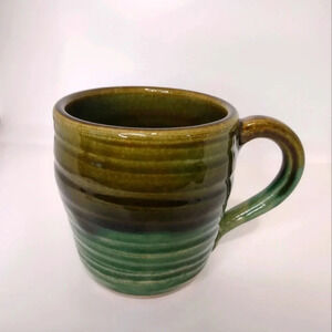 Handmade pottery coffee tea mug, green and brown color
